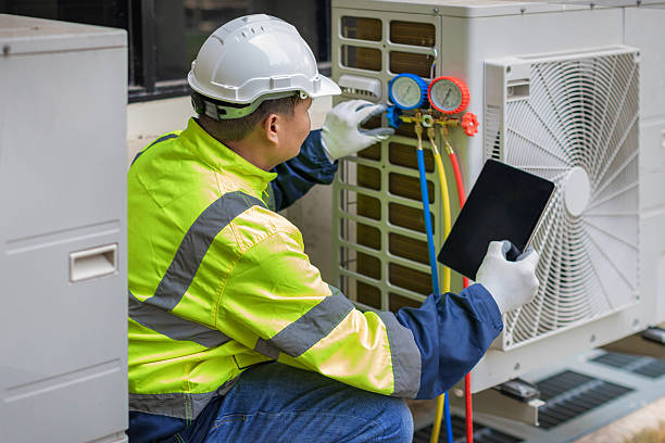 Professional Ductwork Repair technician working in Mastic, NY